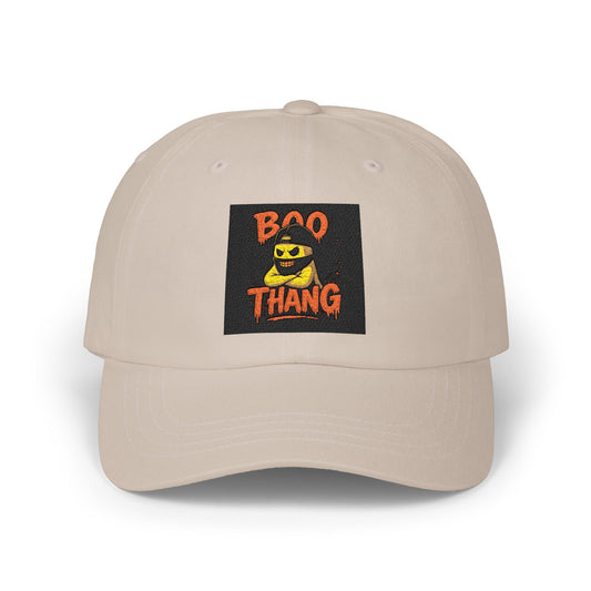 Beige cap with a black patch featuring a ghost and 'BOO THANG' text on a white background