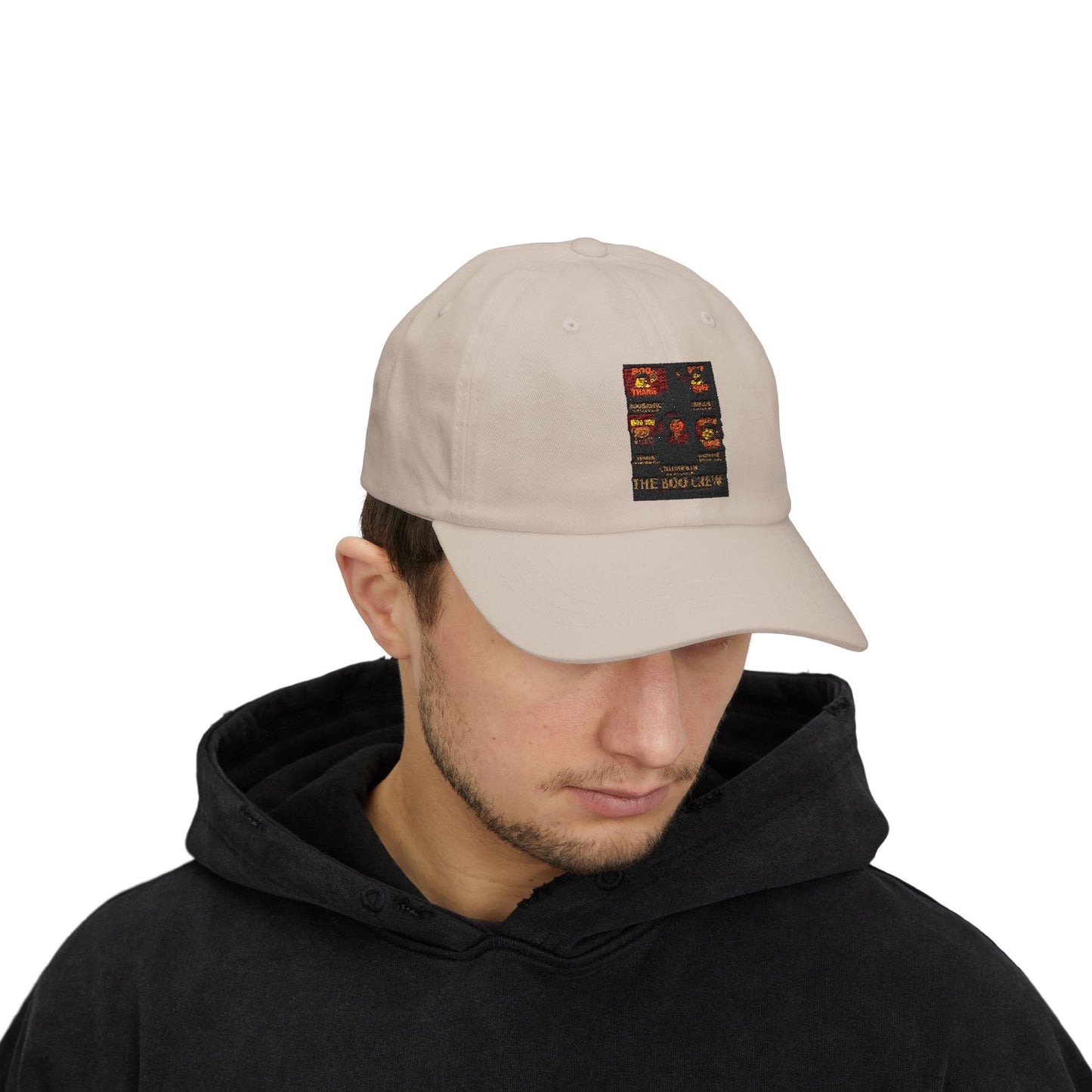 Man wearing a beige cap with a patch on a white background