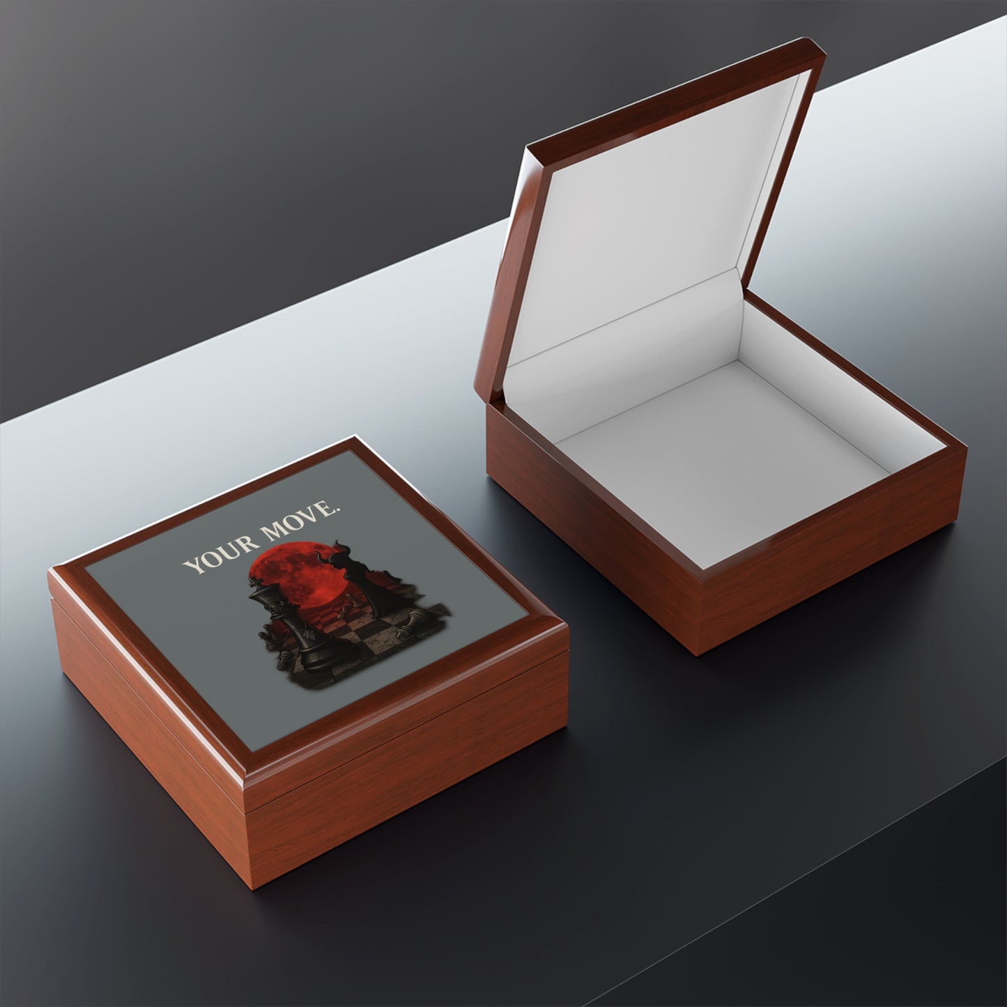 Wooden chess piece box with 'Your Move' text on a reflective surface