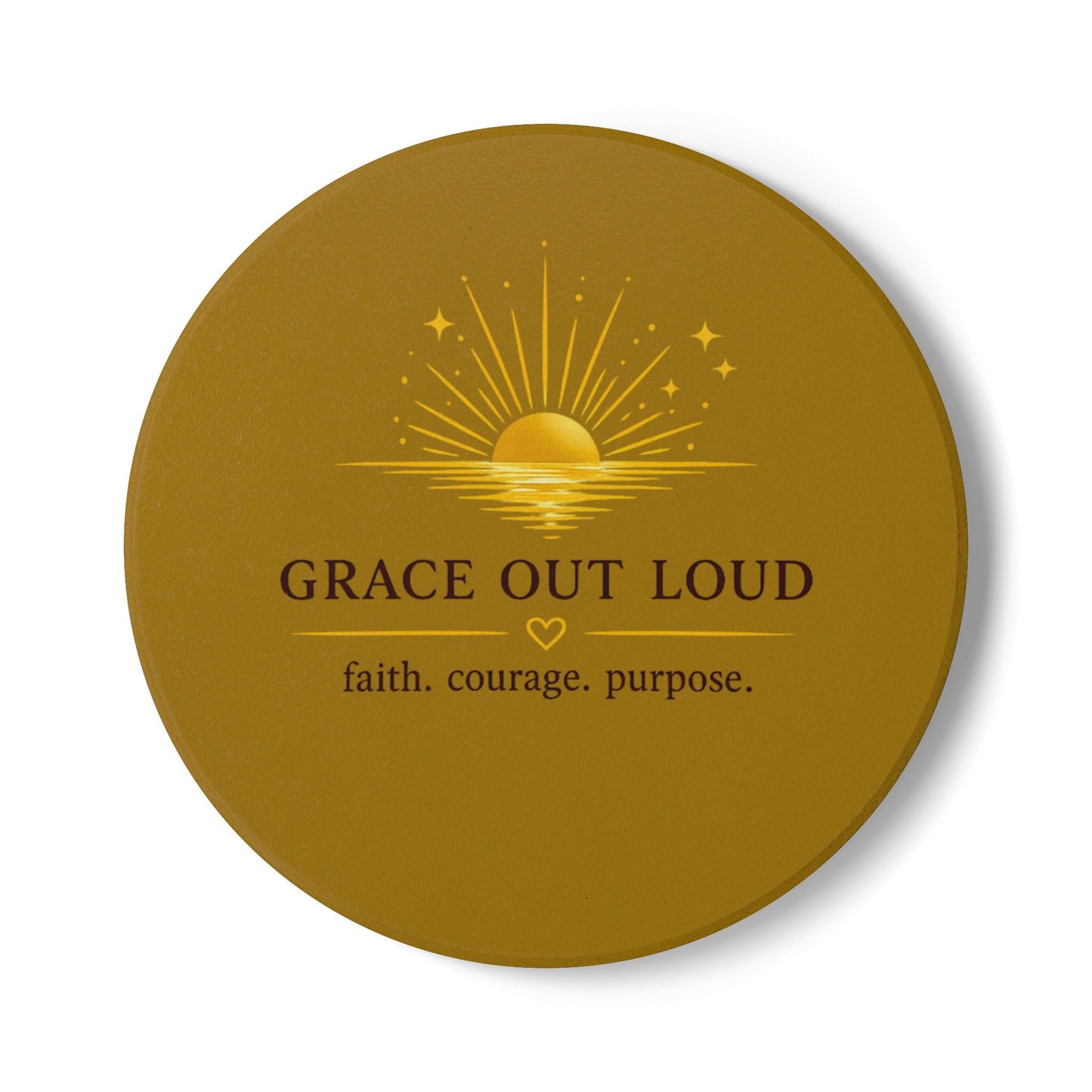 "Grace Out Loud ceramic coaster with inspirational sunrise faith quote — warm cream and gold tones"