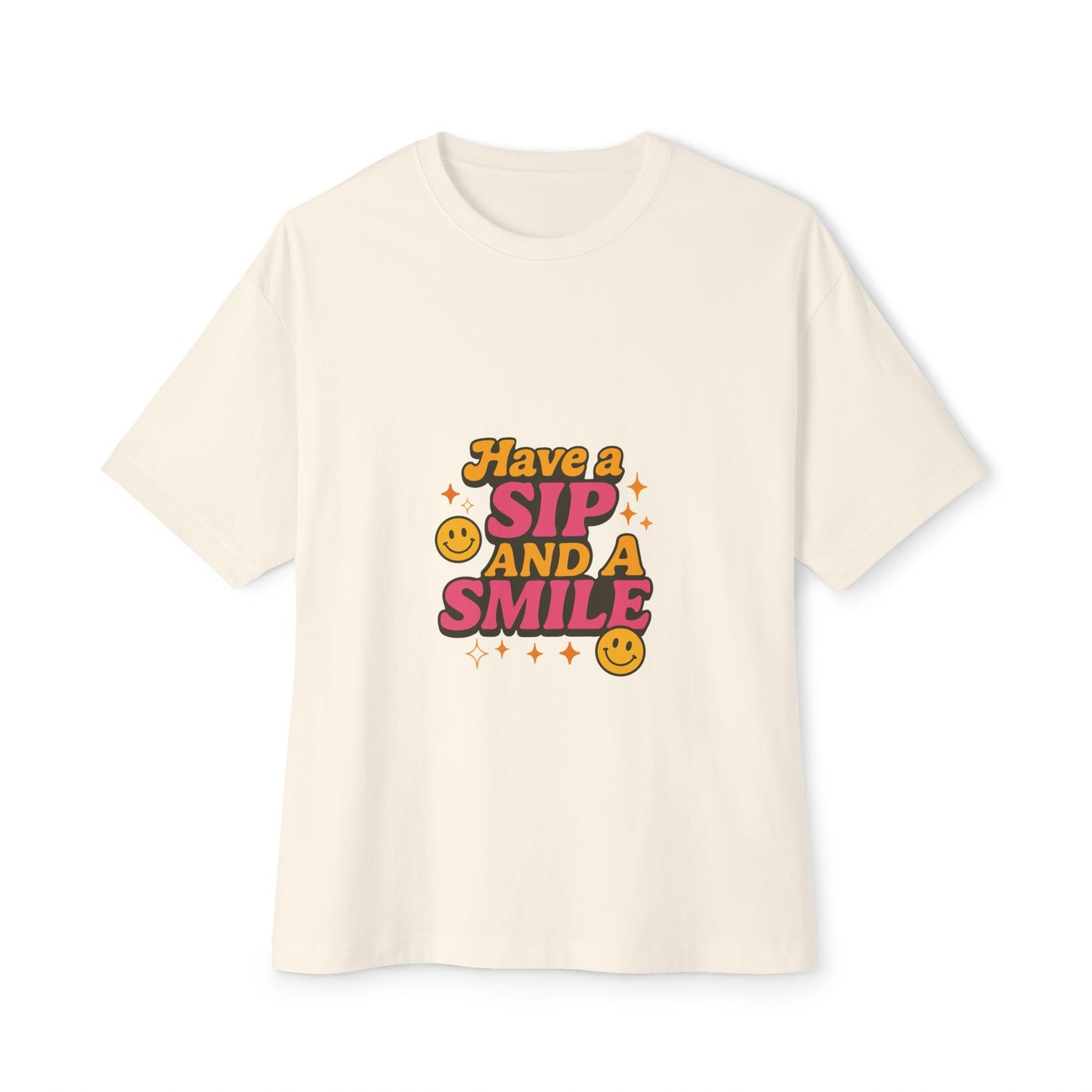 Beige t-shirt with 'Have a Sip and a Smile' text and smiley faces on a white background