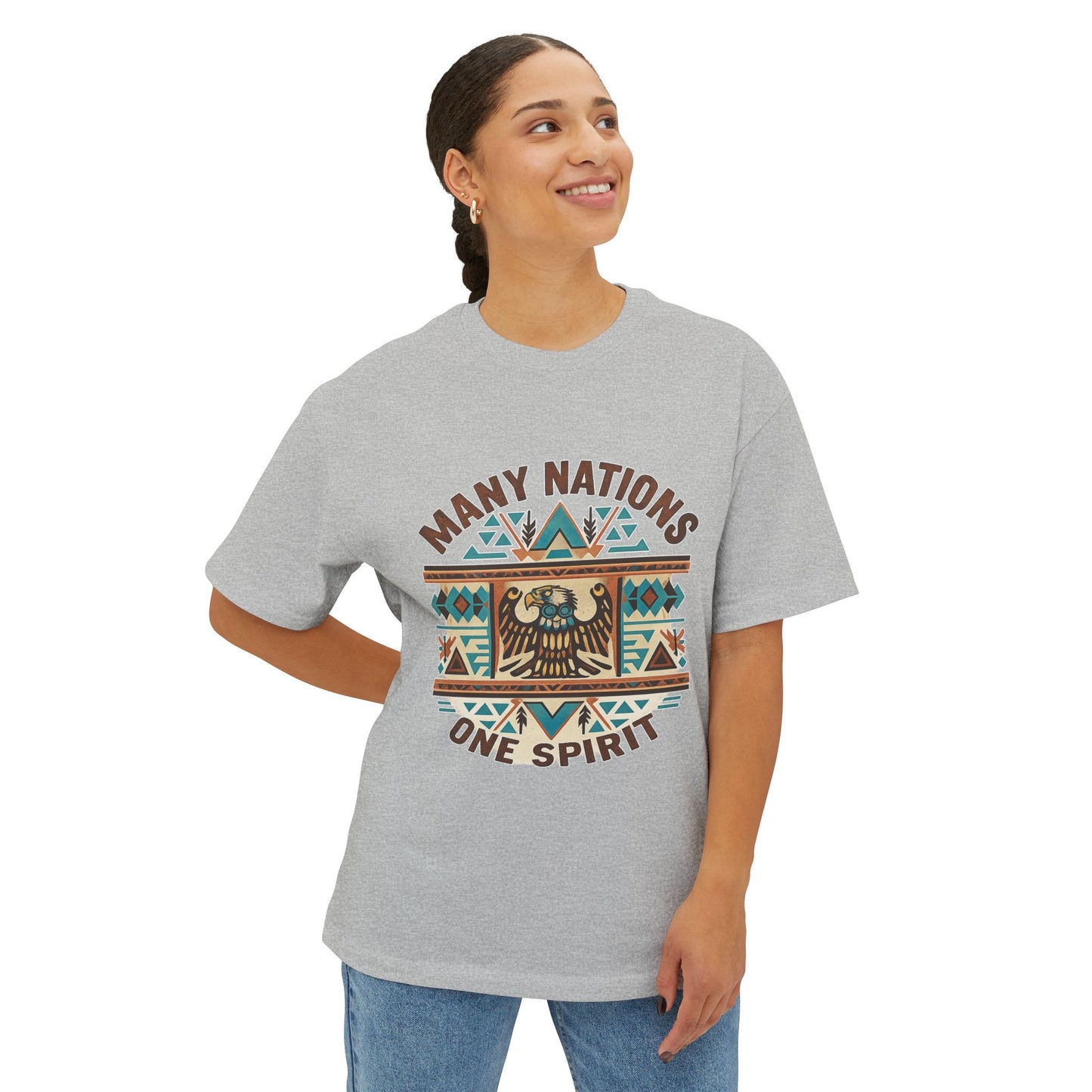 Model wearing a gray t-shirt with 'Many Nations One Spirit' design on a white background