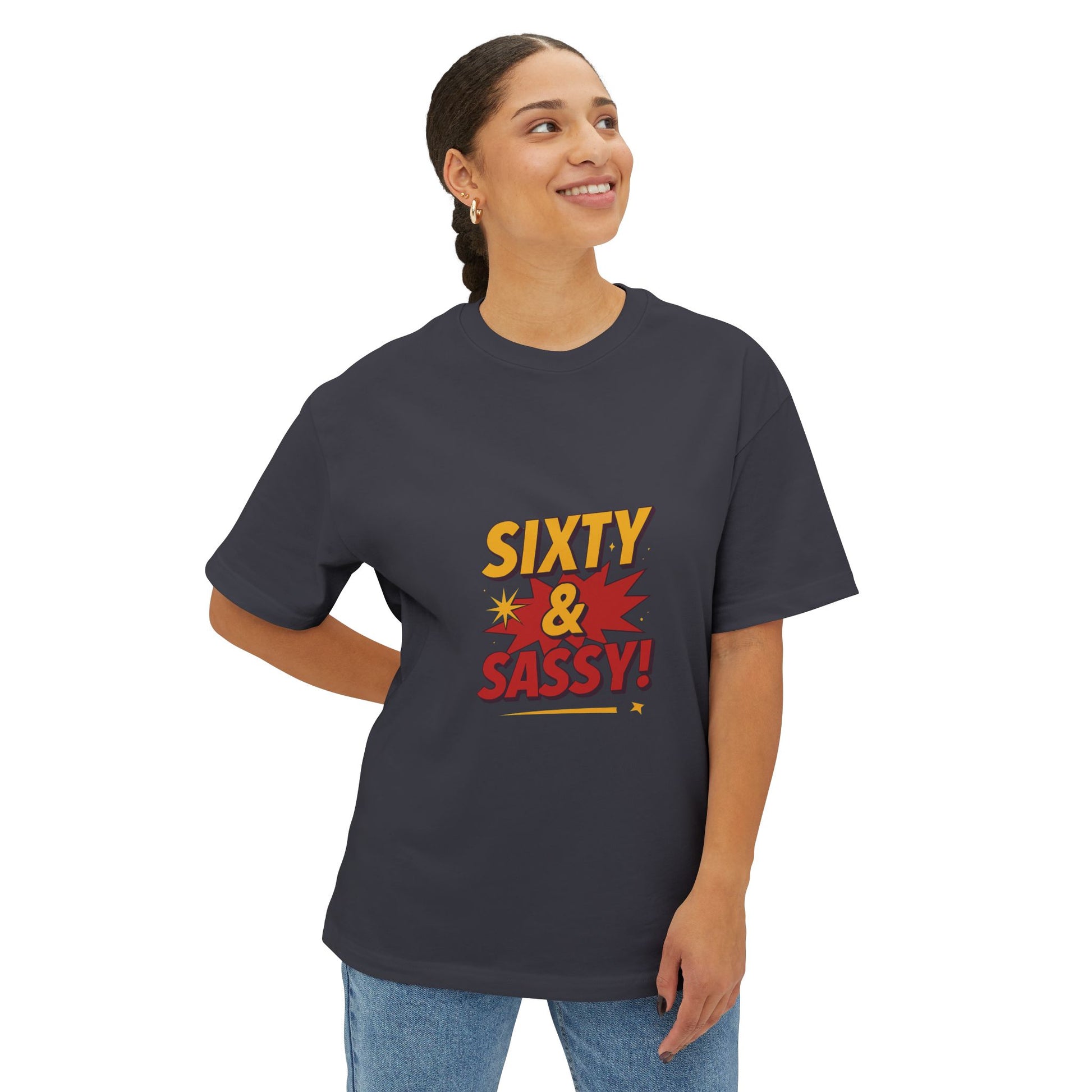 Woman wearing a dark gray t-shirt with 'Sixty & Sassy' text design on a white background