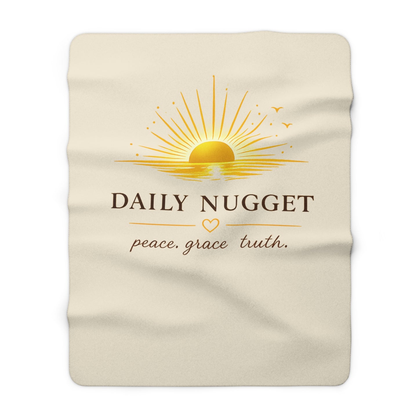 "Sherpa fleece blanket with golden sunrise motif and 'peace. grace. truth.' text on a warm cream background — Daily Nugget Grace Out Loud collection"