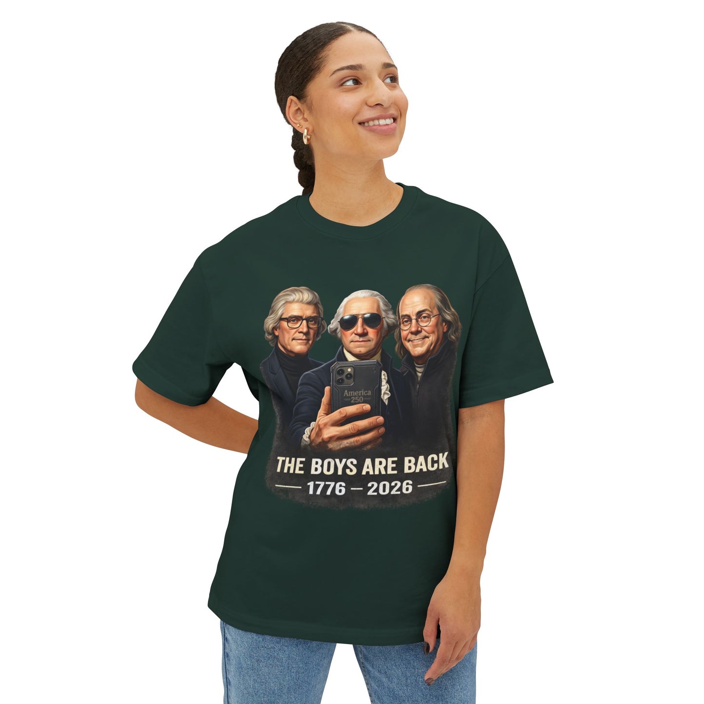 Person wearing a green t-shirt with a graphic of three historical figures and text on a white background