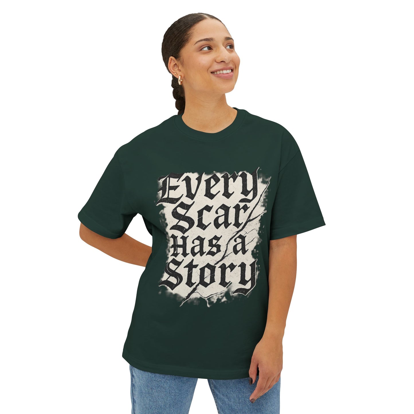 Person wearing a green t-shirt with 'Every Scar Was a Story' text design.