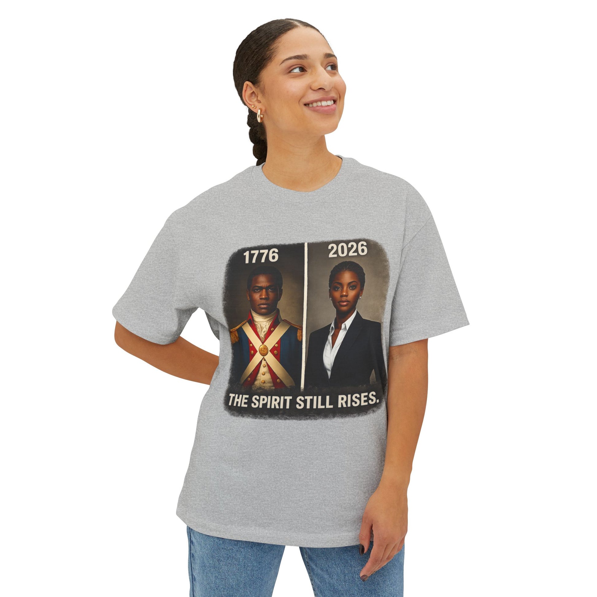 Model wearing a gray t-shirt with a graphic design and text on a white background
